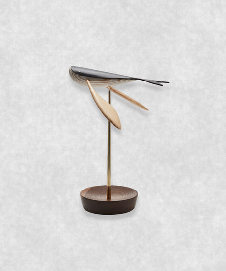 Side view of Flying Whale by Lee Sang-yong – kinetic art sculpture capturing a whale in a graceful floating and balancing form