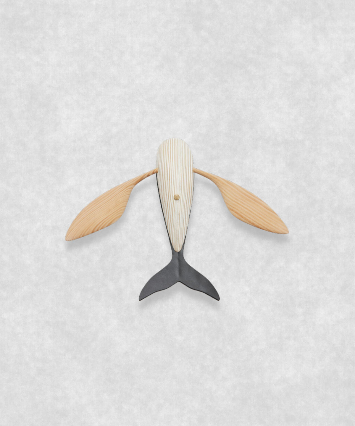 Upside-down view of Flying Whale by Lee Sang-yong – close detailed view of the kinetic whale sculpture’s underside, construction and handcrafted finish