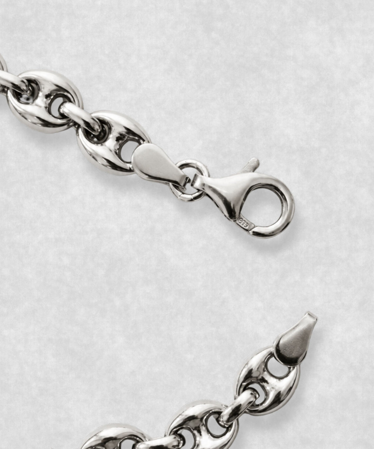 Close-up of 925 sterling silver coffee bean bracelet clasp – polished coffee bean links and detailed fastening mechanism