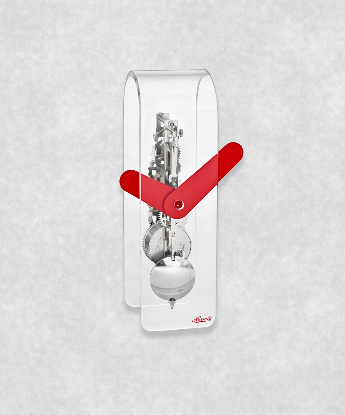 Mechanical skeleton clock with stainless steel movement, pendulum and red hands – transparent acrylic case with black clock faces