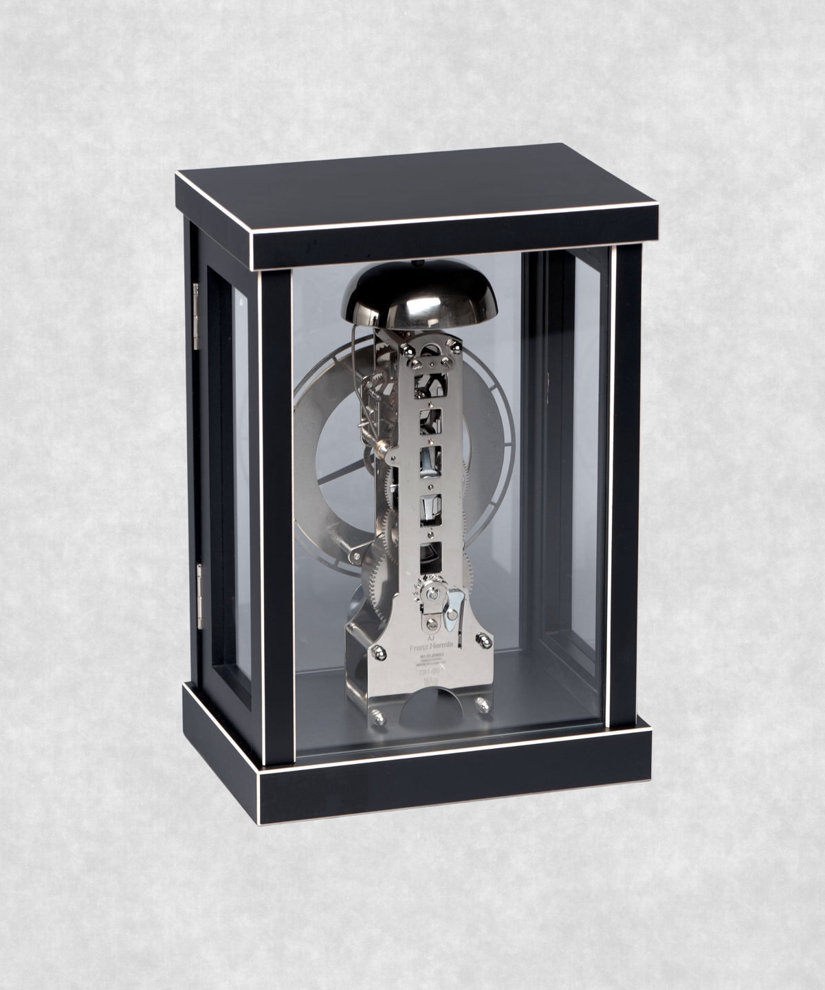 Back view of 14-day mechanical clock with black-painted natural wood frame – exposed movement, pendulum and hourly bell chime