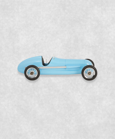 Vintage racing silberfeil car  model inspired by classic Grand Prix racers and Silver Arrow legends, featuring a blue race car body with a striking black seat. A collectible car model for motorsport and classic car enthusiasts. Viewed from  the right side.