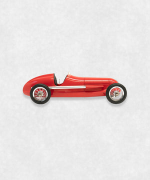 Vintage racing silberfeil car model inspired by classic Grand Prix racers and Silver Arrow legends, featuring a red race car body with a striking black seat. A collectible car model for motorsport and classic car enthusiasts. Viewed from  the right side.