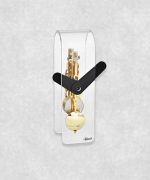 Mechanical skeleton clock with gold movement and pendulum – transparent acrylic case with black clock faces