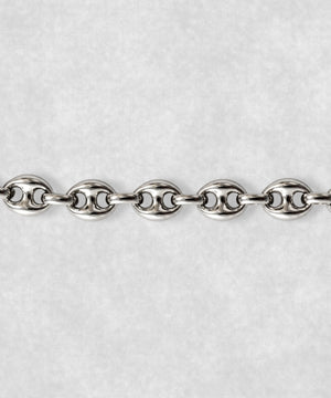 Close-up of 925 sterling silver coffee bean bracelet – detailed polished coffee bean links and sculptural finish
