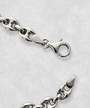 Close-up of 925 sterling silver coffee bean bracelet clasp – polished coffee bean links and detailed fastening mechanism