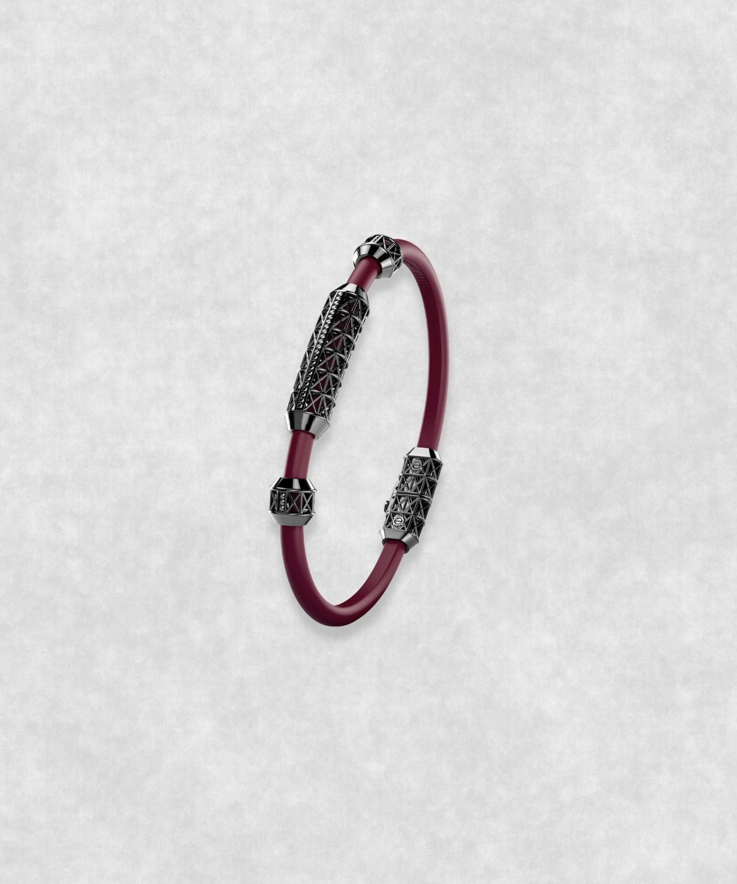 White gold-coated bracelet featuring a medium centerpiece set with 29 diamonds and a flexible bordeaux rubber band.