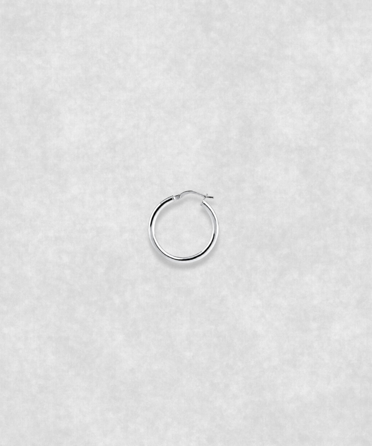 Silver hoop earrings available in three sizes – medium, minimalist hoops