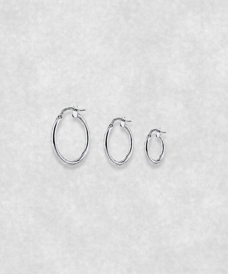 Silver hoop earrings available in three sizes – small, medium and large minimalist hoops