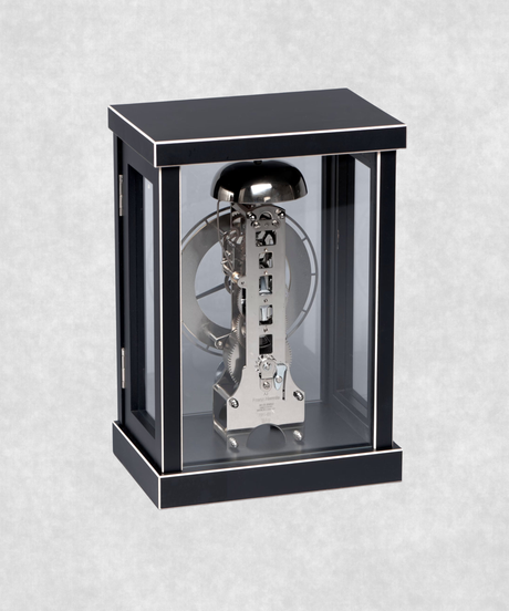 Back view of 14-day mechanical clock with black-painted natural wood frame – exposed movement, pendulum and hourly bell chime